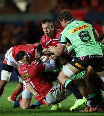 101025 - Scarlets v DHL Stormers - United Rugby Championship - Tom Rogers and Gareth Davies of Scarlets wrestle for the ball