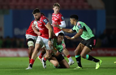 101025 - Scarlets v DHL Stormers - United Rugby Championship - Johnny Williams of Scarlets is tackled by Sacha Feinberg-Mngomezulu of Stormers 