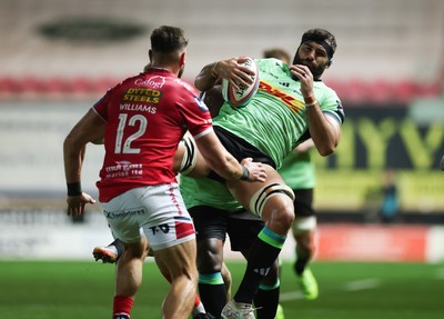 101025 - Scarlets v DHL Stormers, United Rugby Championship - Sazi Sandi of Stormers takes own Jarrod Taylor of Scarlets
