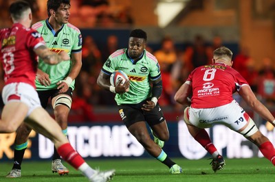 101025 - Scarlets v DHL Stormers, United Rugby Championship - Wandisile Simelane of Stormers takes on Taine Plumtree of Scarlets