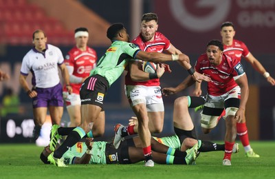 101025 - Scarlets v DHL Stormers, United Rugby Championship -Johnny Williams of Scarlets takes on Sacha Feinberg-Mngomezulu of Stormers