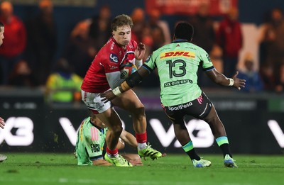 101025 - Scarlets v DHL Stormers, United Rugby Championship - Macs Page of Scarlets takes on Wandisile Simelane of Stormers