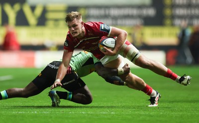 101025 - Scarlets v DHL Stormers, United Rugby Championship - Taine Plumtree of Scarlets takes on Wandisile Simelane of Stormers