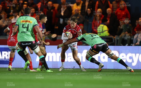 101025 - Scarlets v DHL Stormers - United Rugby Championship - Ellis Mee of Scarlets is tackled by Ben-Jason Dixon of Stormers 