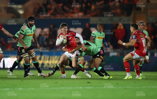101025 - Scarlets v DHL Stormers - United Rugby Championship - Ellis Mee of Scarlets is tackled by Ruhan Nel of Stormers 
