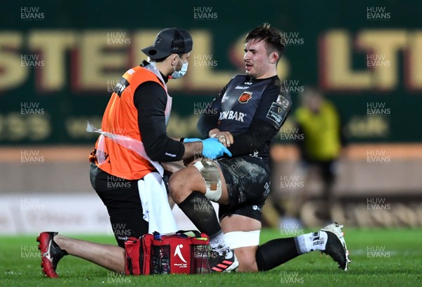 010121 - Scarlets v Dragons - Guinness PRO14 - Taine Basham of Dragons is treated for injury