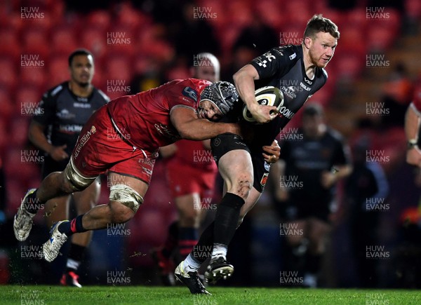 010121 - Scarlets v Dragons - Guinness PRO14 - Jack Dixon of Dragons is tackled by Sione Kalamafoni of Scarlets
