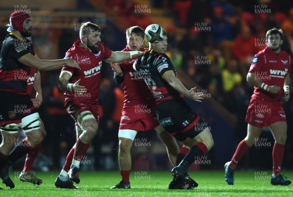 050118 - Scarlets v Dragons - Guinness PRO14 - Jack Dixon of Dragons is tackled by John Barclay of Scarlets