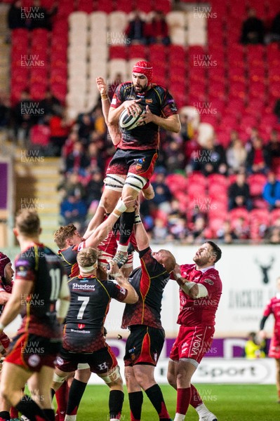 050119 - Scarlets v Dragons - Guinness PRO14 - Cory Hill of Dragons Jumps for the ball 