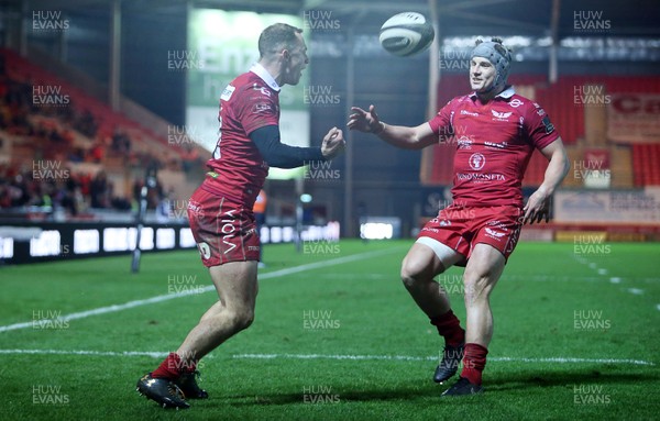050119 - Scarlets v Dragons - Guinness PRO14 - Ioan Nicholas celebrates scoring a try with Jonathan Davies of Scarlets