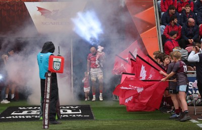 160526 - Scarlets v Dragons RFC, United Rugby Championship - Josh Macleod of Scarlets walked out with his family on his 150th cap