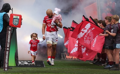 160526 - Scarlets v Dragons RFC, United Rugby Championship - Josh Macleod of Scarlets walked out with his family on his 150th cap