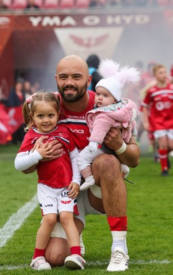 160526 - Scarlets v Dragons RFC, United Rugby Championship - Josh Macleod of Scarlets walked out with his family on his 150th cap