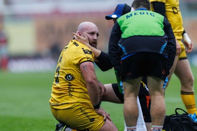 160526 - Scarlets v Dragons RFC - United Rugby Championship - Dillon Lewis of Dragons receives medical attention after getting injured