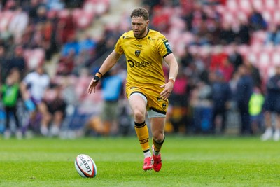 160526 - Scarlets v Dragons RFC - United Rugby Championship - Angus O’Brien of Dragons covers back in defence