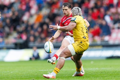 160526 - Scarlets v Dragons RFC - United Rugby Championship - Carwyn Leggatt-Jones of Scarlets kicks across field for Macs Page to score a try