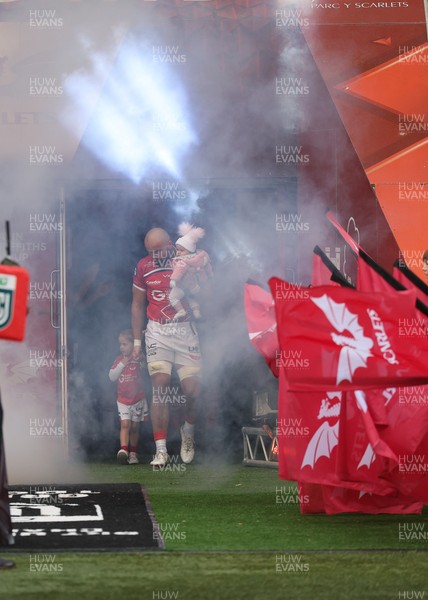 160526 - Scarlets v Dragons RFC, United Rugby Championship - Josh Macleod of Scarlets walked out with his family on his 150th cap