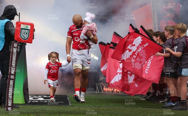 160526 - Scarlets v Dragons RFC, United Rugby Championship - Josh Macleod of Scarlets walked out with his family on his 150th cap