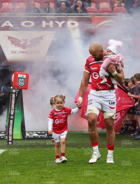 160526 - Scarlets v Dragons RFC, United Rugby Championship - Josh Macleod of Scarlets walked out with his family on his 150th cap