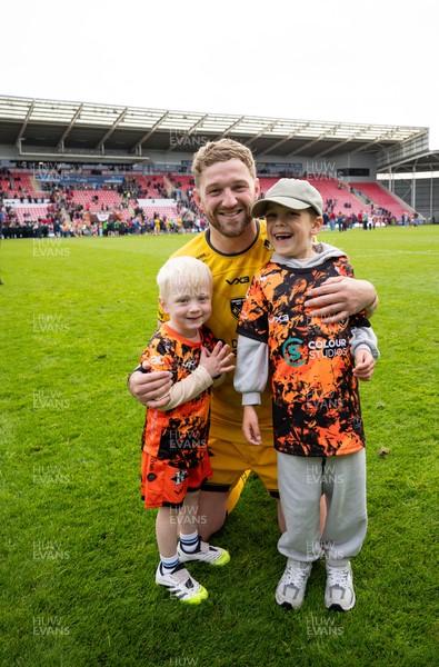 160526 - Scarlets v Dragons RFC, United Rugby Championship - Angus O’Brien of Dragons with his children at the end of the match