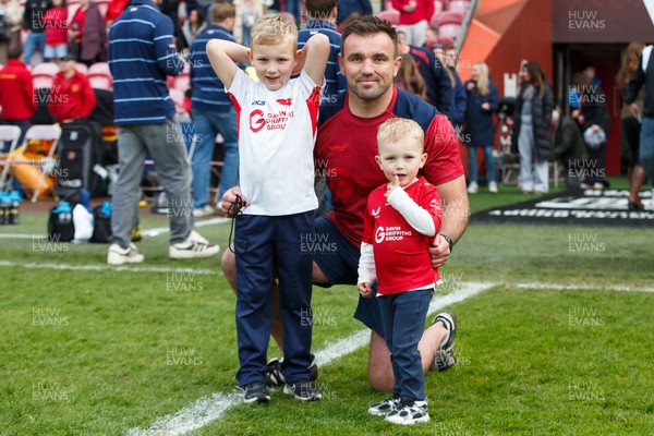 160526 - Scarlets v Dragons RFC - United Rugby Championship - Scarlets coach Emyr Phillips with his children at the end of the match