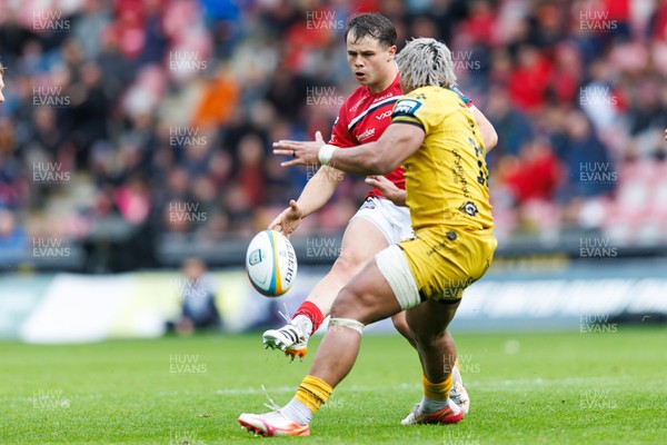 160526 - Scarlets v Dragons RFC - United Rugby Championship - Carwyn Leggatt-Jones of Scarlets kicks across field for Macs Page to score a try