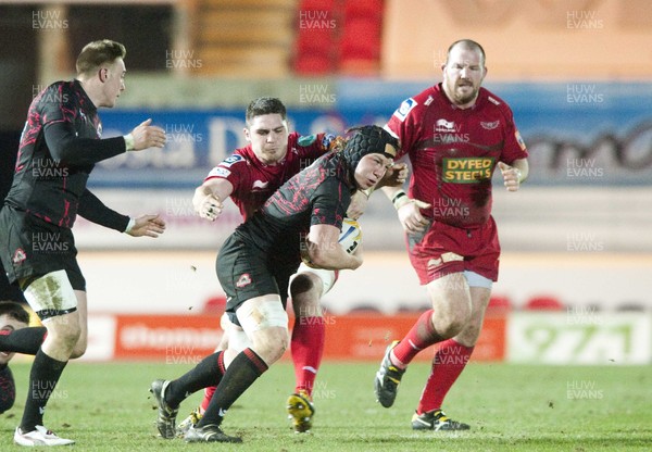 010313 - Scarlets v Edinburgh - RaboDirect PRO12 -Edinburgh's Hamish Watson is tackled by Rob McCusker of Scarlets 