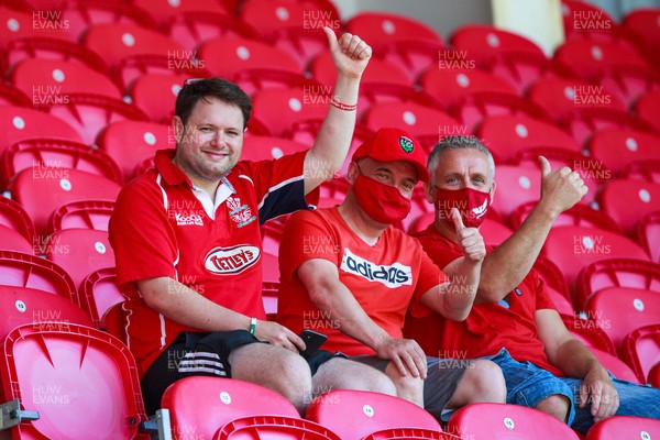 130621 - Scarlets v Edinburgh - Guinness PRO14 Rainbow Cup - Scarlets supporters in the stands at Parc y Scarlets before the match