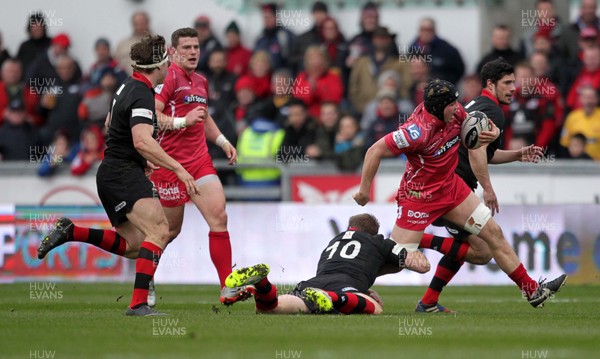 280315 - Scarlets v Edinburgh - Guinness PRO12 - James Davies of Scarlets is tackled by Greig Tonks of Edinburgh