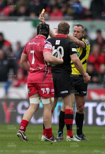 280315 - Scarlets v Edinburgh - Guinness PRO12 - Greig Tonks of Edinburgh is shown a yellow card