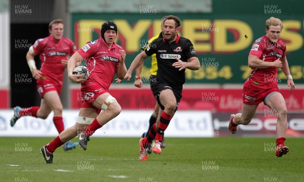 280315 - Scarlets v Edinburgh - Guinness PRO12 - James Davies of Scarlets breaks through the Edinburgh defence