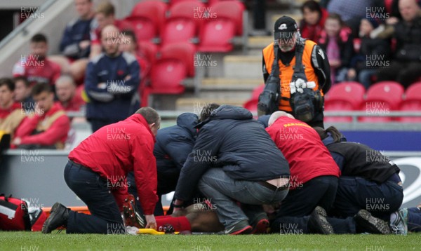 280315 - Scarlets v Edinburgh - Guinness PRO12 - Michael Tagicakibau of Scarlets is taken off injured