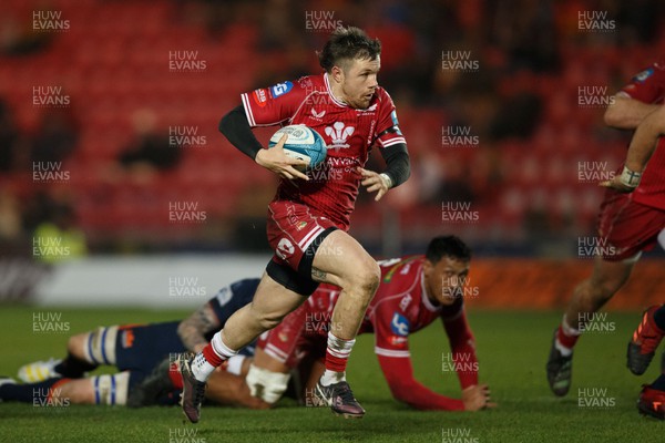 180223 - Scarlets v Edinburgh Rugby - United Rugby Championship - Steff Evans of Scarlets heads for the try line to score a try