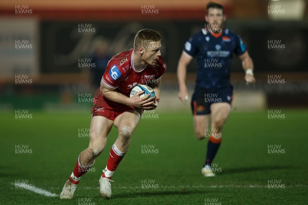 180223 - Scarlets v Edinburgh Rugby - United Rugby Championship - Johnny McNicholl of Scarlets gathers the ball