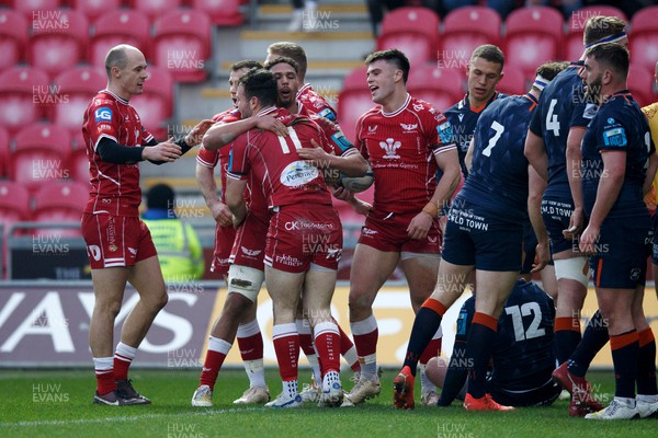 180223 - Scarlets v Edinburgh Rugby - United Rugby Championship - Dan Davis congratulates Ryan Conbeer of Scarlets after scoring a try