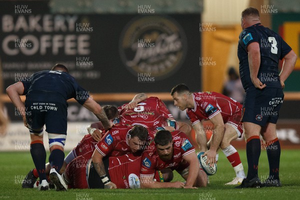 180223 - Scarlets v Edinburgh Rugby - United Rugby Championship - Gareth Davies of Scarlets receives the ball from a ruck