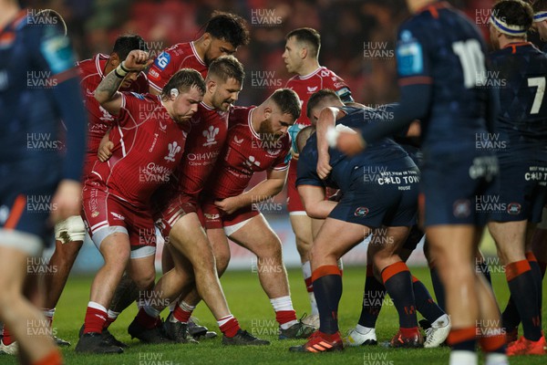 180223 - Scarlets v Edinburgh Rugby - United Rugby Championship - Scarlets front row of Sam Wainwright, Shaun Evans and Kemsley Mathias pack down in a scrum