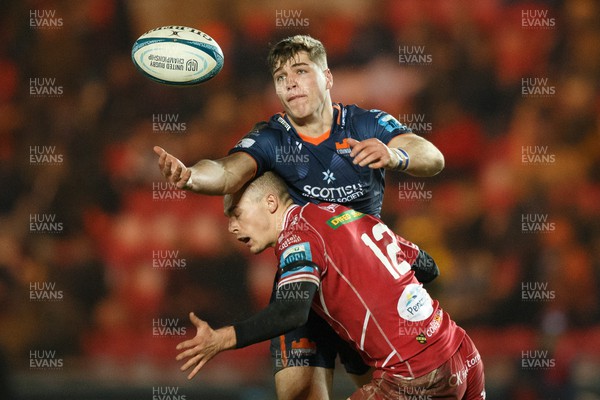 180223 - Scarlets v Edinburgh Rugby - United Rugby Championship - Jack Blain of Edinburgh and Ioan Nicholas of Scarlets compete for the ball