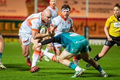 190124 - Scarlets v Edinburgh Rugby - EPCR Challenge Cup - Dave Cherry of Edinburgh  is tackled by Ioan Lloyd of Scarlets