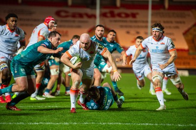 190124 - Scarlets v Edinburgh Rugby - EPCR Challenge Cup - Dave Cherry of Edinburgh  is tackled by Ioan Lloyd of Scarlets