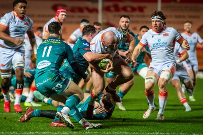 190124 - Scarlets v Edinburgh Rugby - EPCR Challenge Cup - Dave Cherry of Edinburgh  is tackled by Ryan Elias of Scarlets