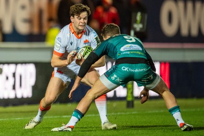 190124 - Scarlets v Edinburgh Rugby - EPCR Challenge Cup - Chris Dean of Edinburgh is tackled by Kieran Hardy of Scarlets