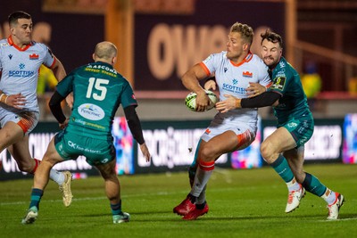 190124 - Scarlets v Edinburgh Rugby - EPCR Challenge Cup - Duhan van der Merwe of Edinburgh is tackled by Ryan Conbeer of Scarlets