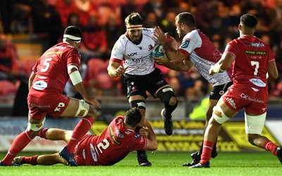 011021 - Scarlets v Emirates Lions - United Rugby Championship - Jaco Kriel of Lions is tackled by Ryan Elias of Scarlets