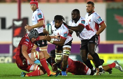 011021 - Scarlets v Emirates Lions - United Rugby Championship - Vincent Tshituka of Lions is tackled by Jac Price of Scarlets