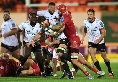 011021 - Scarlets v Emirates Lions - United Rugby Championship - Jaco Kriel of Lions is tackled by Blade Thomson of Scarlets