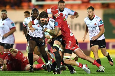 011021 - Scarlets v Emirates Lions - United Rugby Championship - Jaco Kriel of Lions is tackled by Blade Thomson of Scarlets