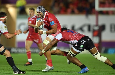 011021 - Scarlets v Emirates Lions - United Rugby Championship - Sione Kalamafoni of Scarlets is tackled by Vincent Tshituka of Lions