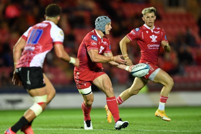 011021 - Scarlets v Emirates Lions - United Rugby Championship - Jonathan Davies of Scarlets gets the ball away