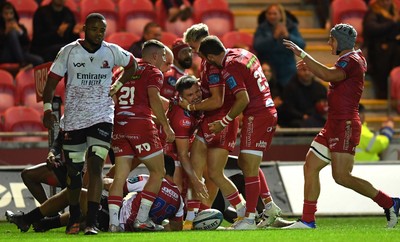 011021 - Scarlets v Emirates Lions - United Rugby Championship - Steff Evans of Scarlets celebrates scoring try with team mates